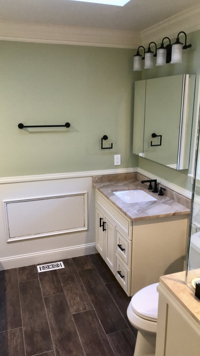Bathroom 3 vanity and paneled walls