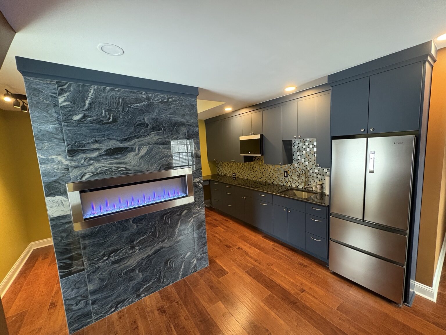 Completed garage conversion living area and kitchen