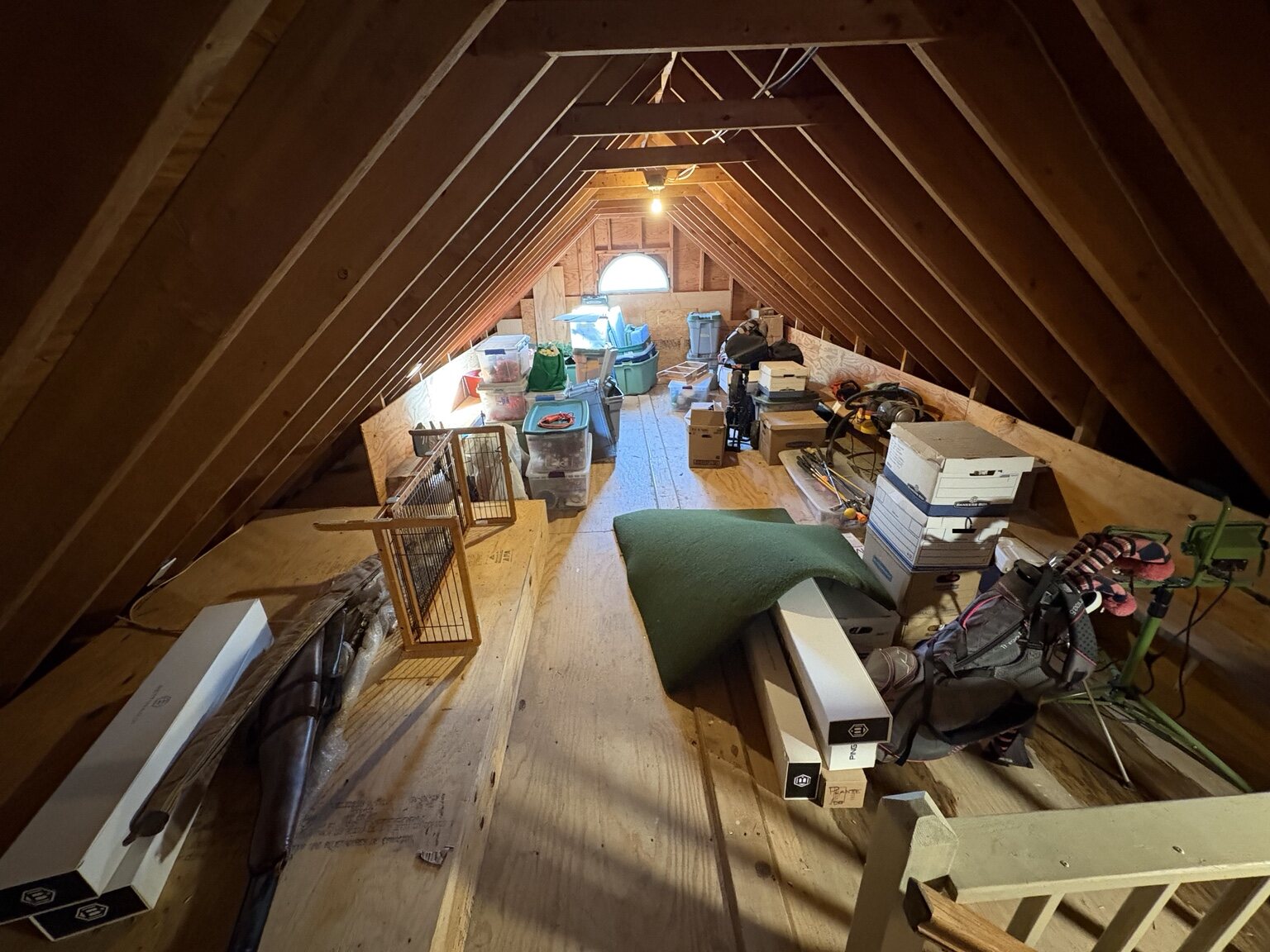 Open-rafter garage storage space before conversion