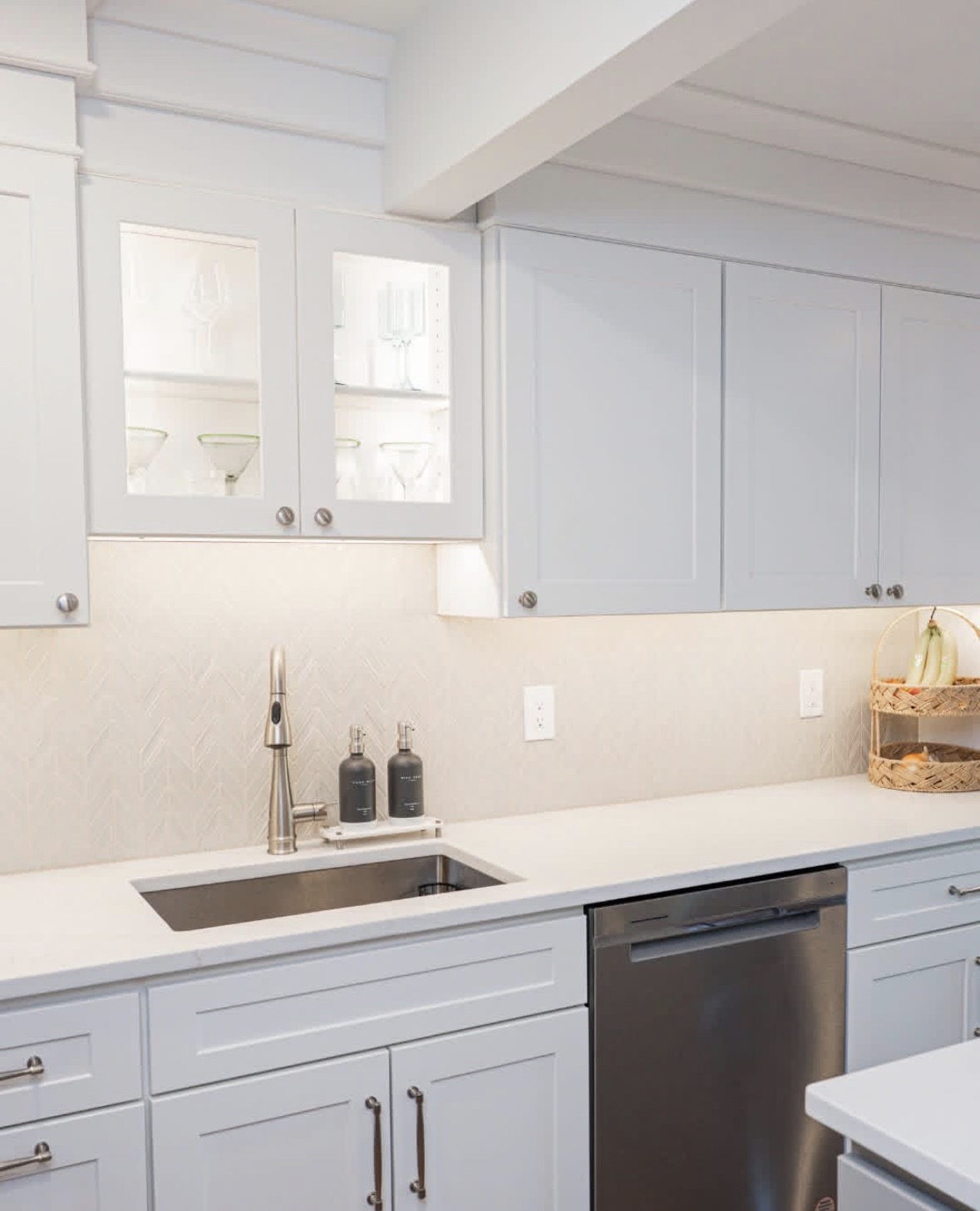 Renovated kitchen with extended countertop and cabinetry