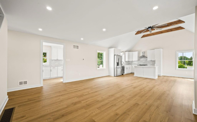 Wide view of the new open kitchen and living area