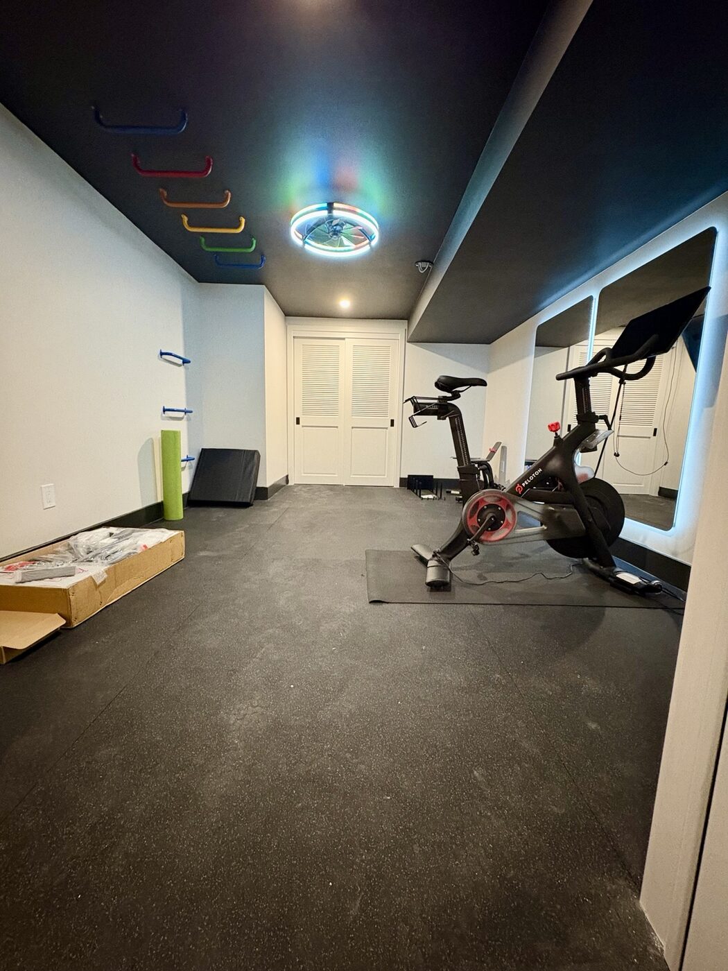Basement gym with durable rubber tile flooring